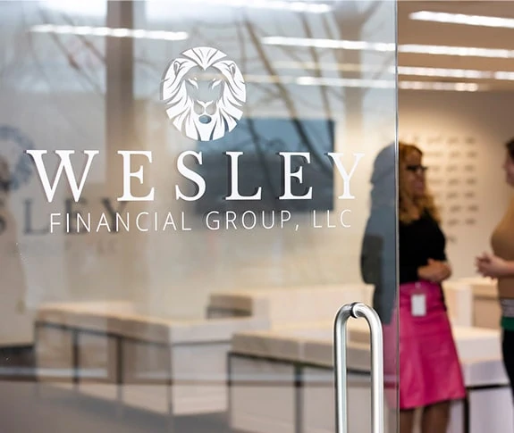 wesley financial logo on glass door