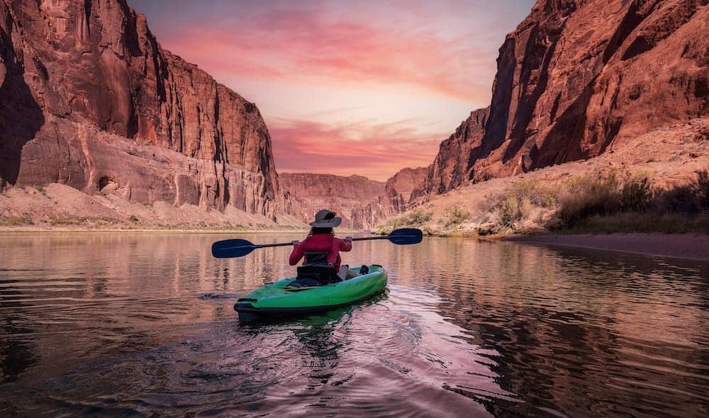 A man kayaking in river | Arizona timeshare cancellation