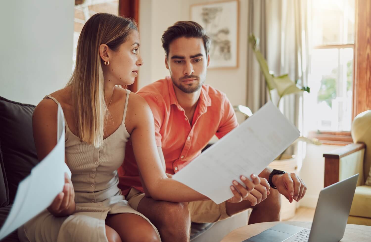 Stressed couple reviewing their agreement | How to get out of a timeshare