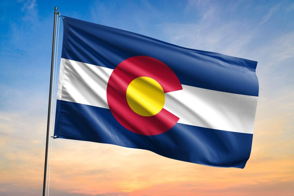 Colorado state flag in the wind | Colorado timeshare cancellation
