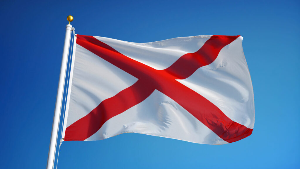 State flag blowing in the wind | Timeshare cancellation in Alabama