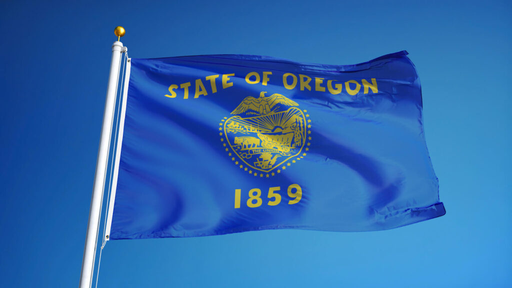 State flag waving in the wind | Timeshare cancellation in Oregon