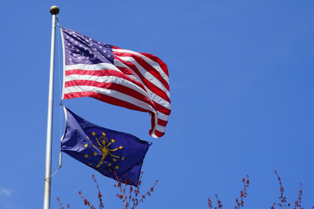 State flag blowing in the wind | Timeshare cancellation in Indiana