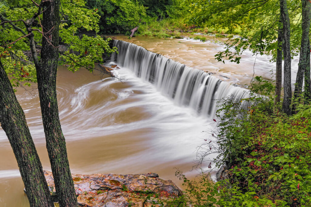 A waterfall in a park | Timeshare cancellation in Indiana