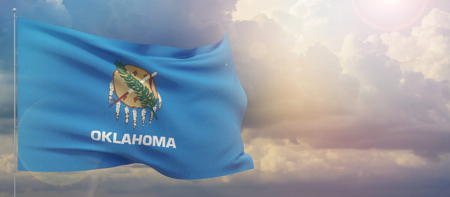 State flag waving in the wind | Oklahoma timeshare cancellation