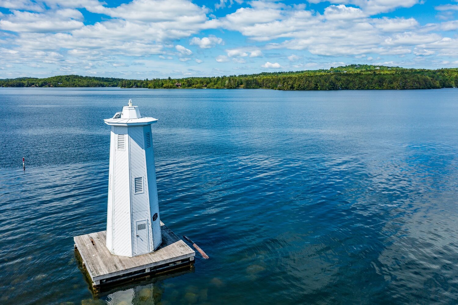 Lighthouse in a lake | New Hampshire timeshare cancellation