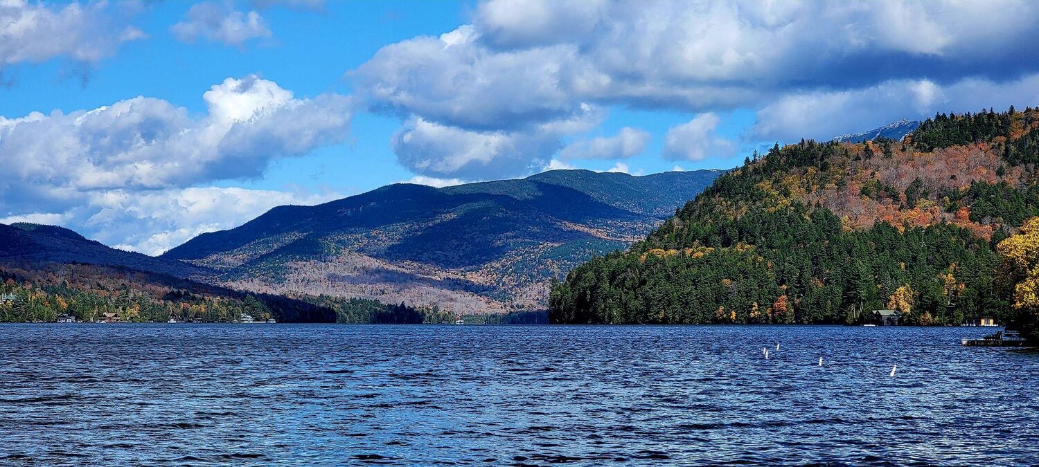 Mountains behind a lake | New York timeshare cancellation